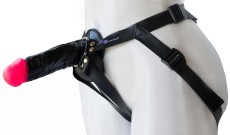 Страпон Harness Realistic с розовой головкой - 17,8 см. Страпон Harness Realistic с розовой головкой - 17,8 см.