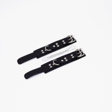 Черные кожаные наручники с регулируемыми ремешками