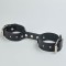 Черные кожаные наручники-фиксатор