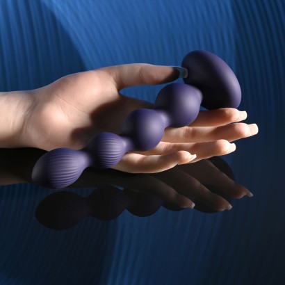 Фиолетовые анальные бусы с вибрацией и вращением Pleasure Orbit - 17,8 см.