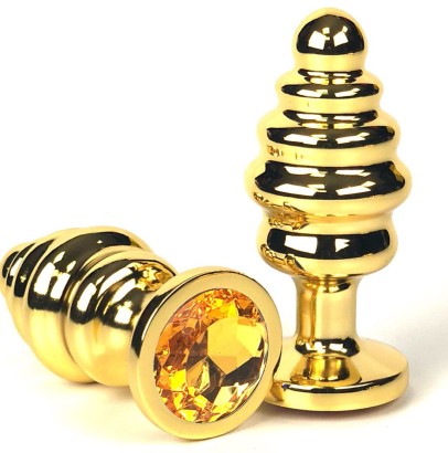 Золотистая ребристая анальная пробка с оранжевым кристаллом - 7 см.