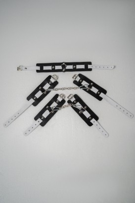 Набор фиксаторов из черной и белой натуральной кожи