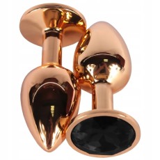 Золотистая анальная пробка с черным кристаллом - 6,8 см.