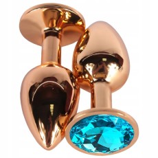 Золотистая гладкая анальная пробка с голубым кристаллом - 6,8 см.